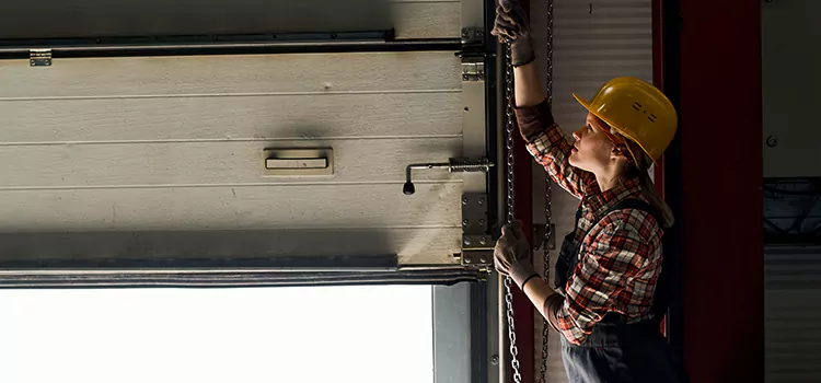 Addressing Common Garage Door Stoppage Issues in Candler-McAfee, GA