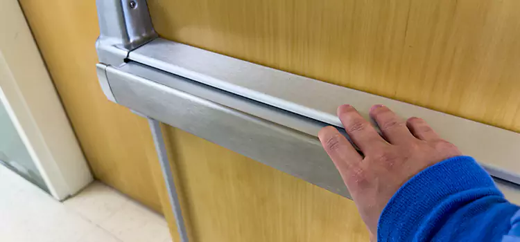 Installing a Push Bar on a Door Candler-McAfee